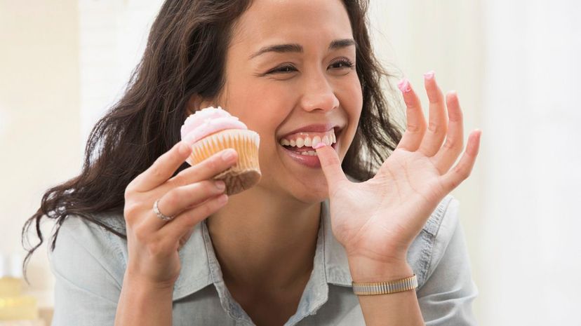 Woman Eating Cupcake