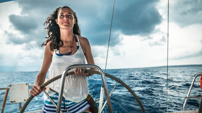 Woman sailing ocean