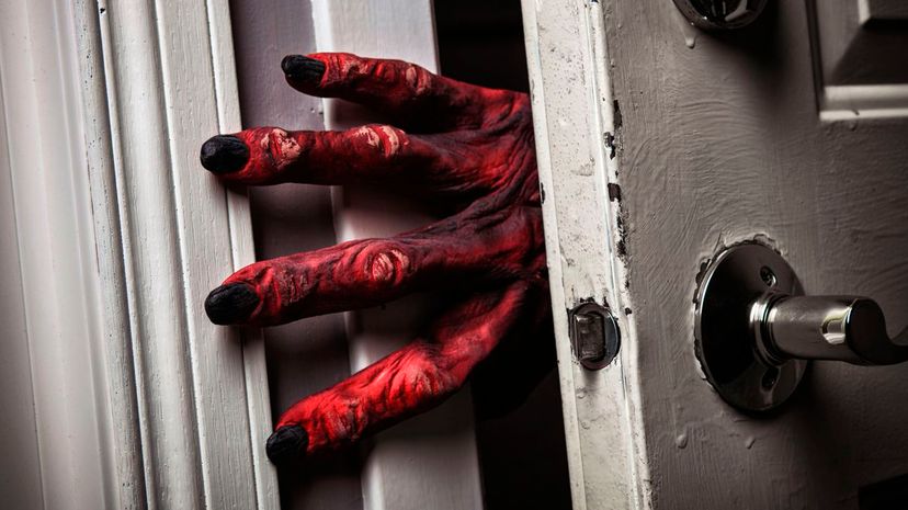 Monster's hand opens door