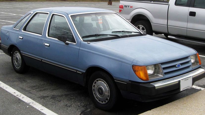 24-1984-1985_Ford_Tempo_sedan_--_03-09-2011