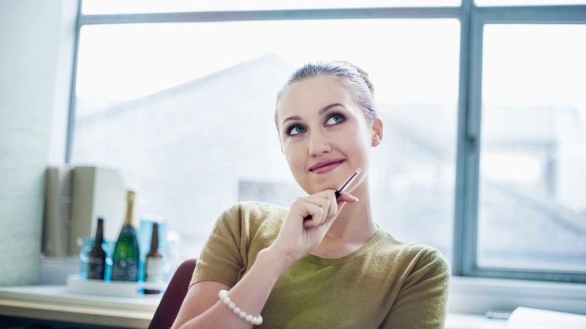 Woman thinking and smiling