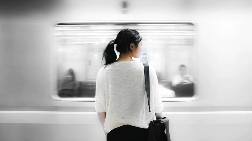 Woman waiting for train