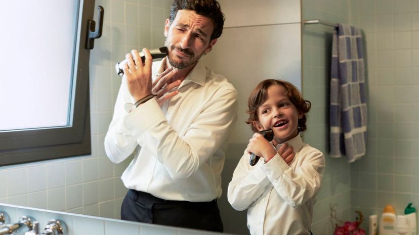 Dad and Son Shaving Together