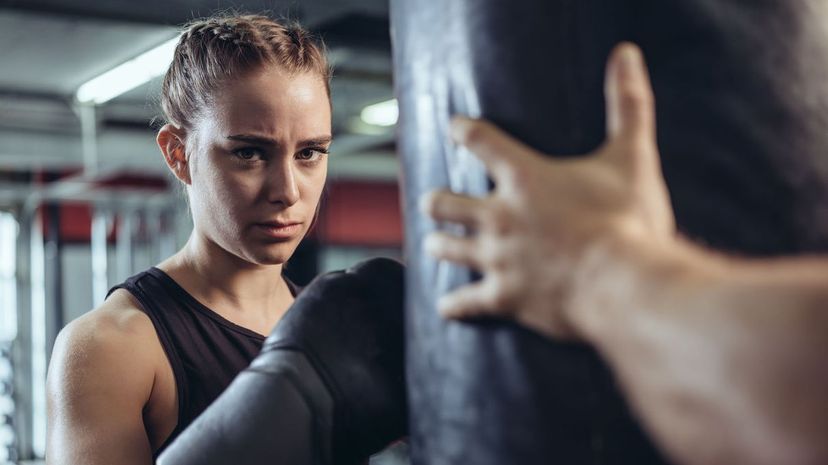 Woman practicing boxing