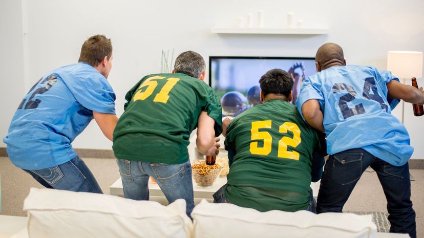 Footballs fans watching TV