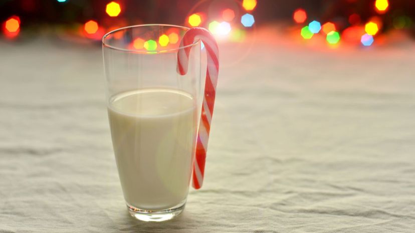 Glass of milk with candy cane