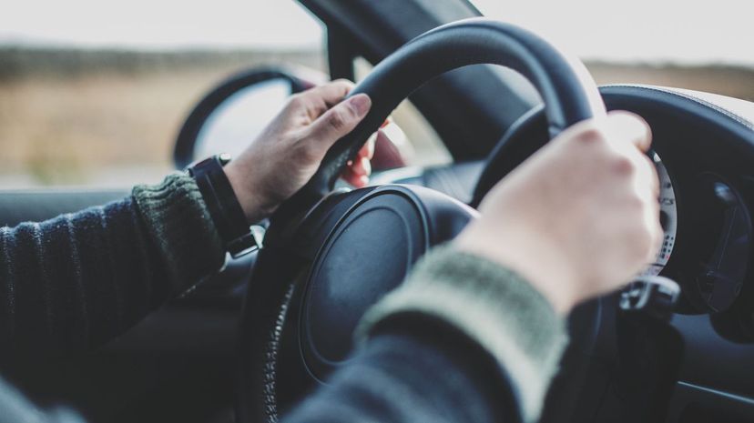 Male hands driving