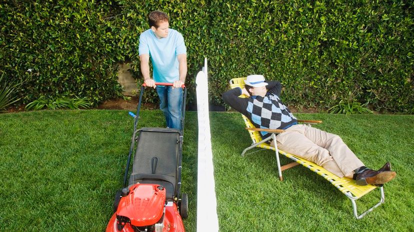 Man mowing lawn while neighbor sleeps