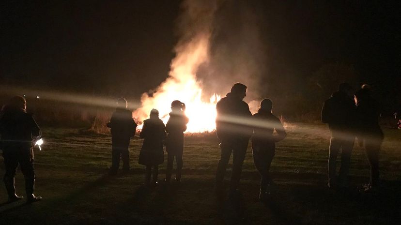 Families around bonfire