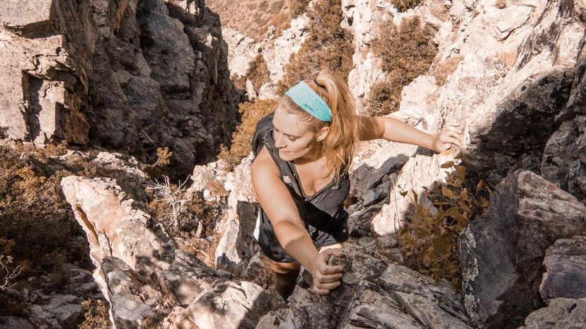 Woman outdoor rock climbing