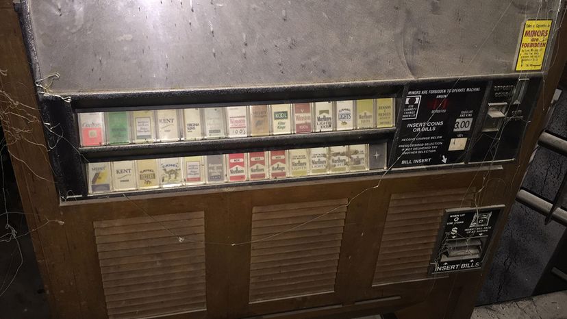 Self-serve cigarette machine