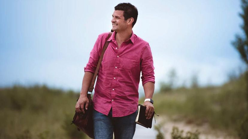 Man carrying book