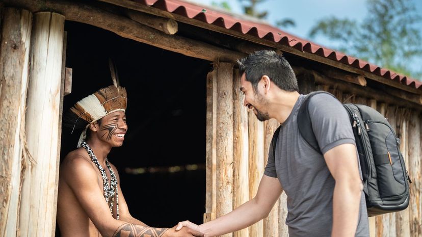Indigenous Brazilian Young Man Portrait from Guarani ethnicity, Welcoming the tourist