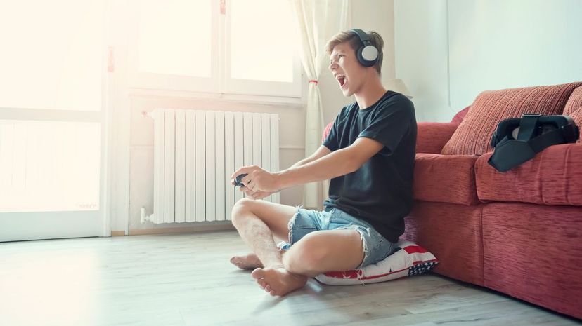 Teen playing video game