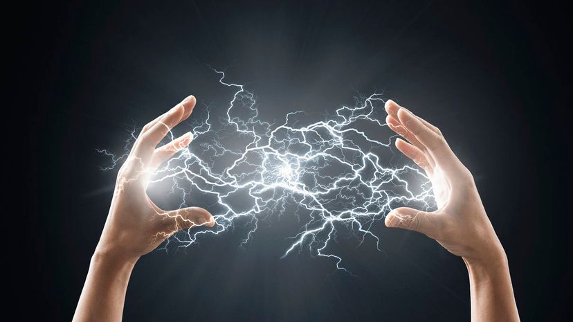 Electric energy sparks from a hand