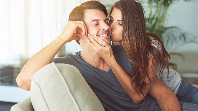 Couple cheek kiss