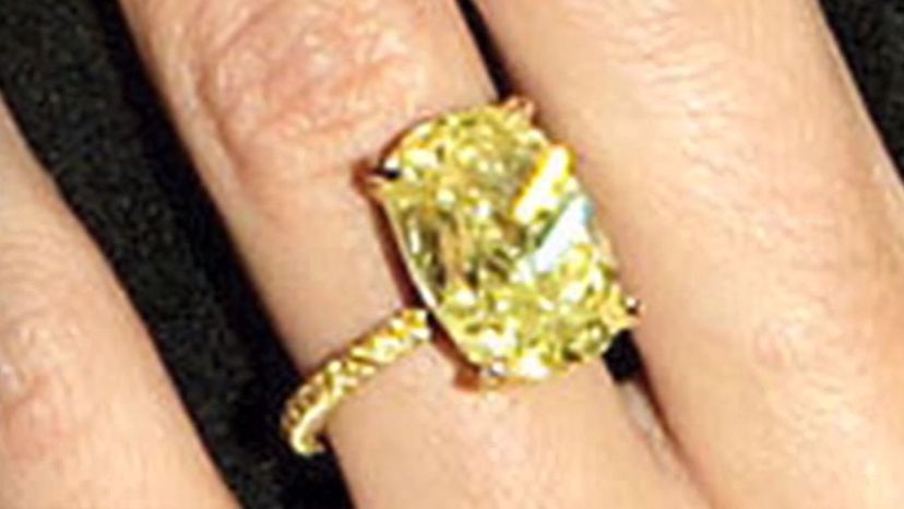 Heidi Klum - Canary Yellow Center Diamond Set in a Gld Band of Pave Diamonds