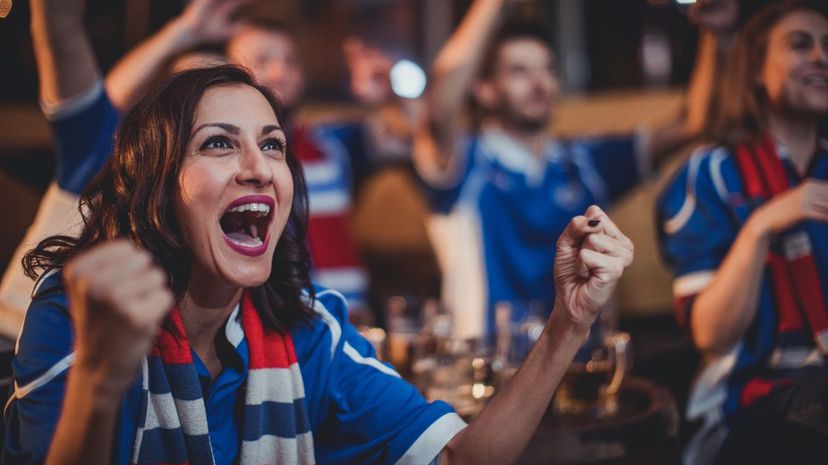 Watching Soccer Wearing Scarf