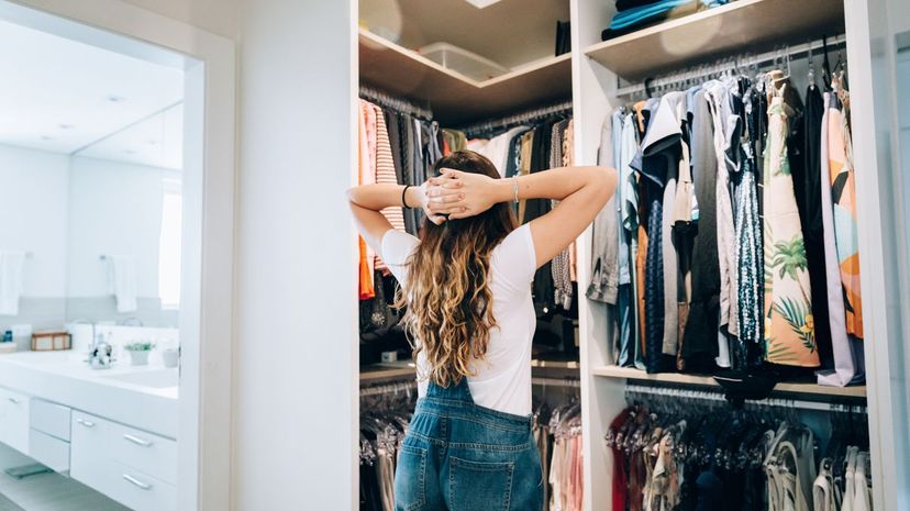 Young teenager girl choosing what to wear
