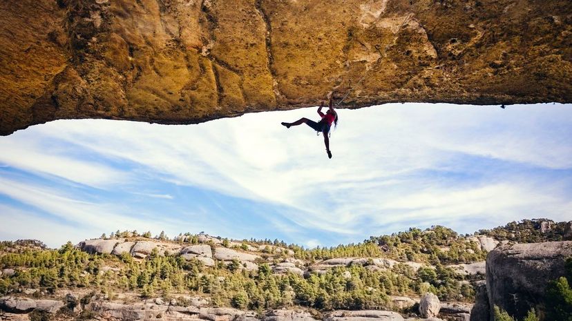 Woman rock climbing Adventur nature outdoors