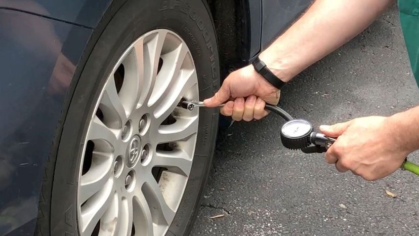 Tire inflator with gauge