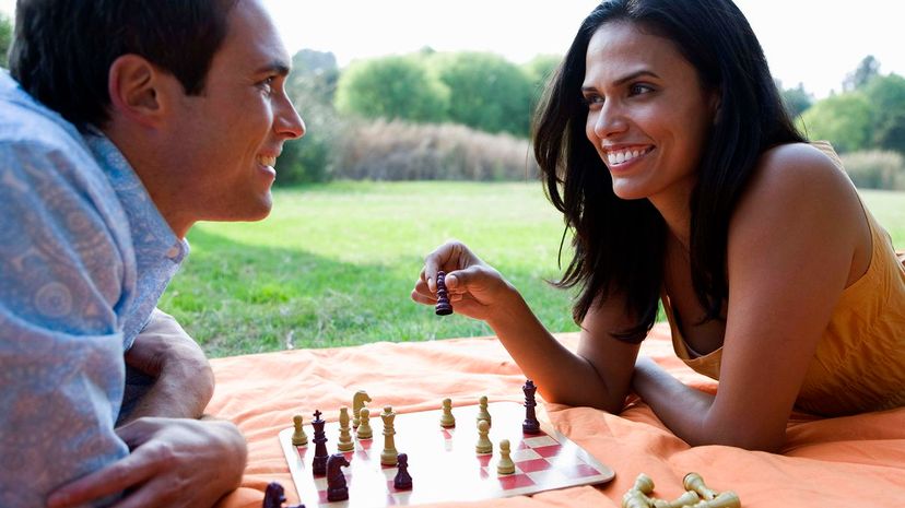 couple playing chess