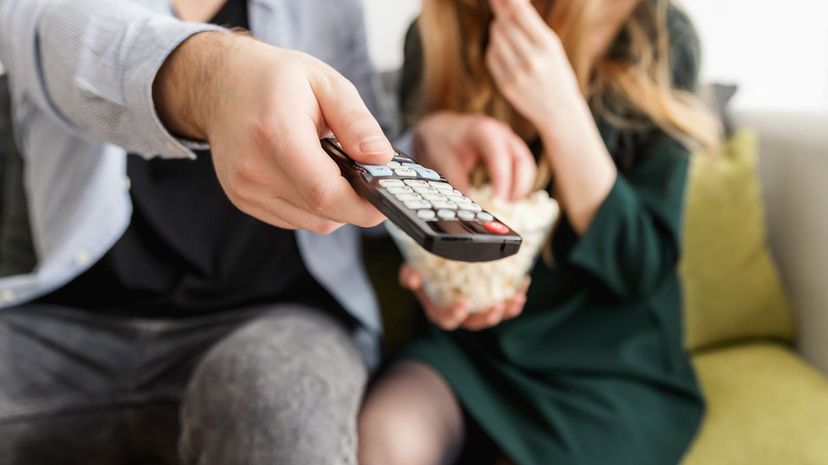 Man Holding Remote