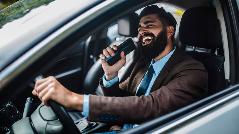 Man singing in car