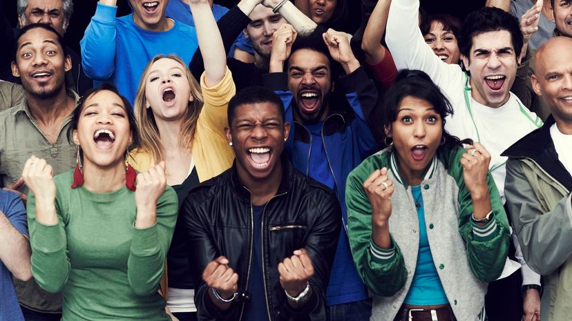 Crowd of sports fans cheering