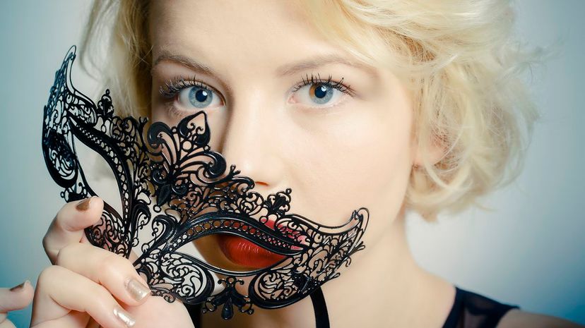 36 Woman removing mask