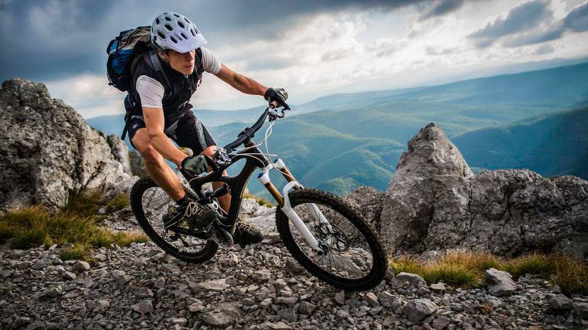 Biker Riding on a Mountain Trail