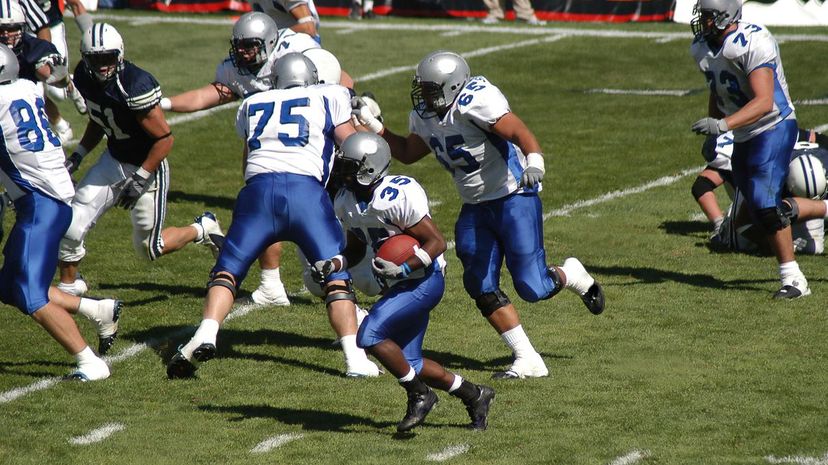 Football player rushing for a touchdown