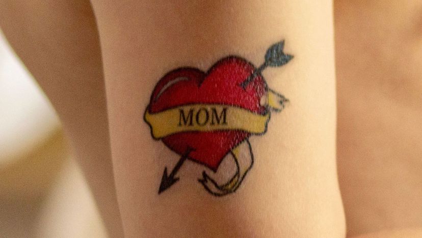 Kid with mom tattoo