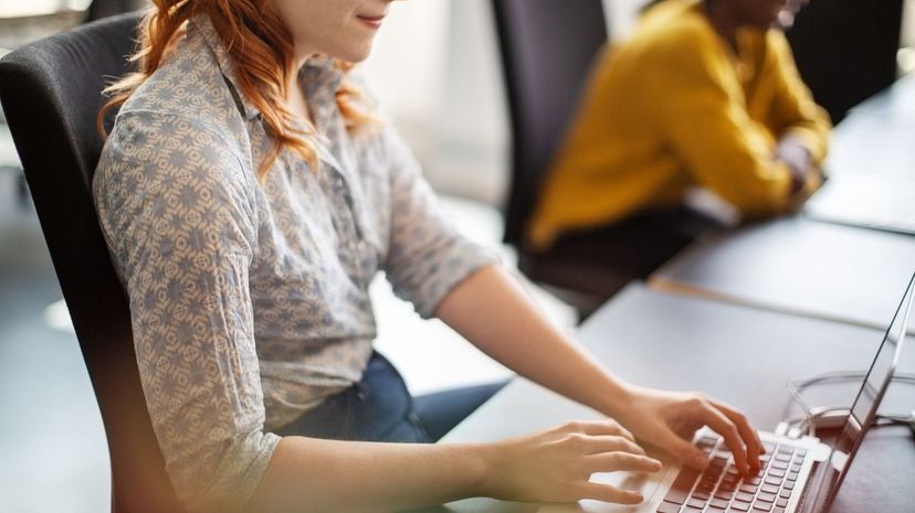 Businesswoman working on laptop