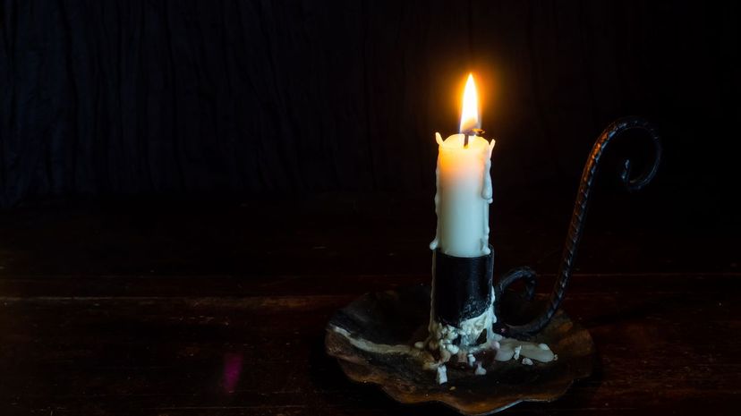 Creepy burning candle