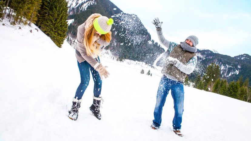 Couple in snowball fight