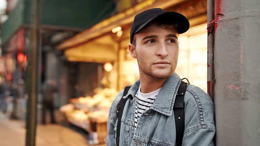 Confident young man in street