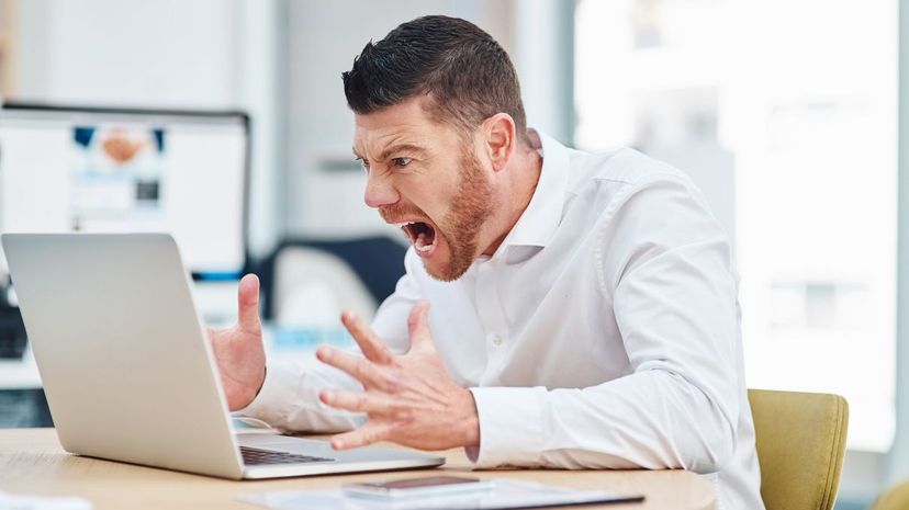 Man yelling at computer