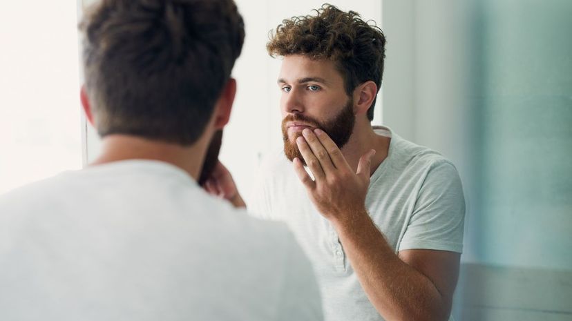 Bearded man getting ready for the day morning routine