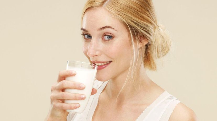 Woman drinks milk
