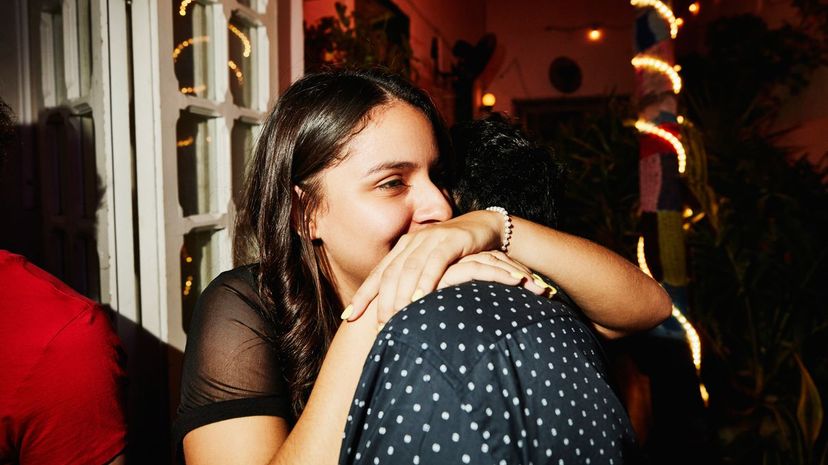 Woman embracing boyfriend