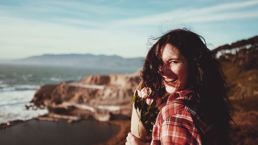 Woman Laughing at Beach