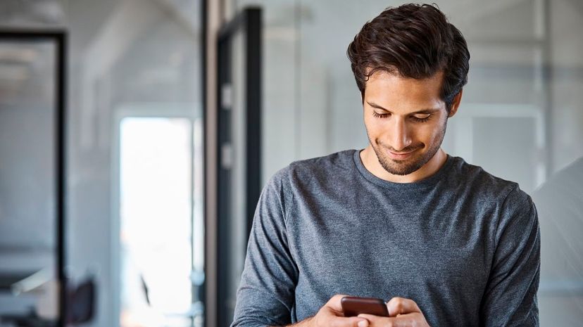 Young Guy Using Phone