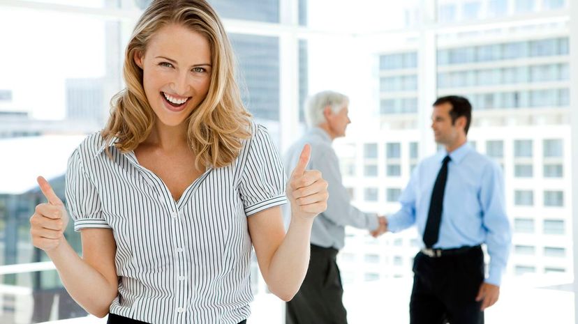 Businesswoman with thumbs up