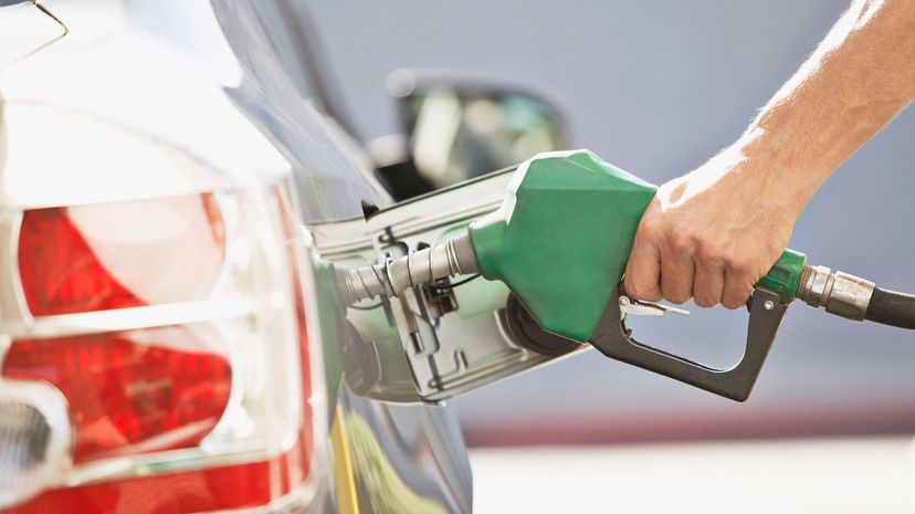 Man pumping gas