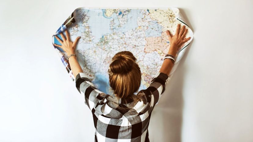 Young woman looking at map