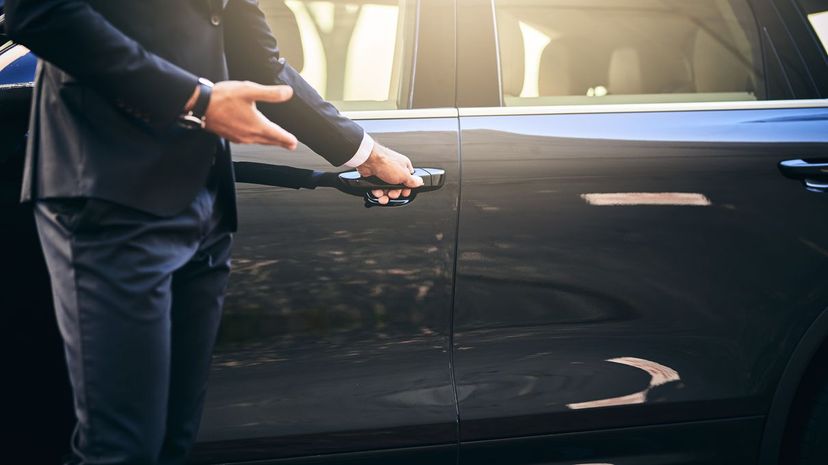 Guy opening car door