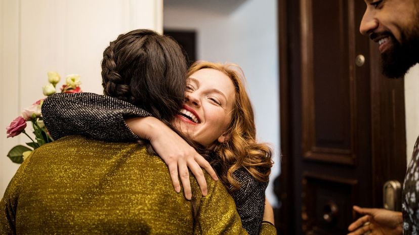 Woman Hugging in Greeting