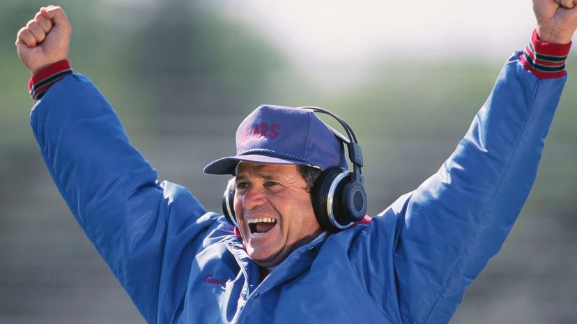 American football coach cheering