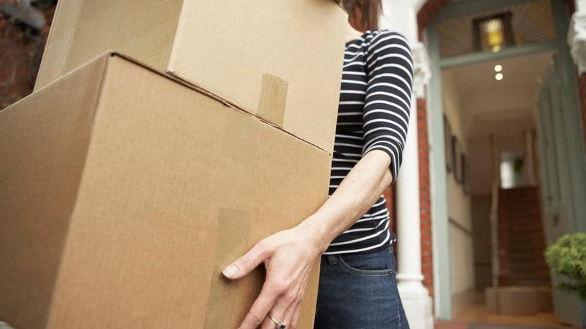 Woman moving boxes